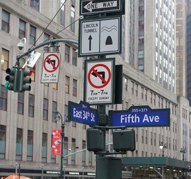 road sign fifth avenue new york