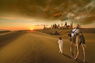 a man with a camel walking in the middle of the desert towards the kuwait city 