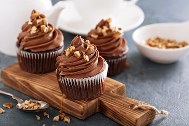 chocolate caramel cupcake with nuts and butterscotch syrup