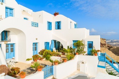 white architecture of greek style apartments in imerovigli village on santorini island, cyclades, greece