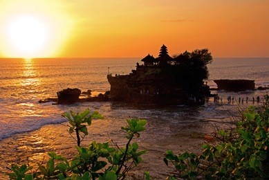 sunset at bali's famous tanah lot temple, indonesia
