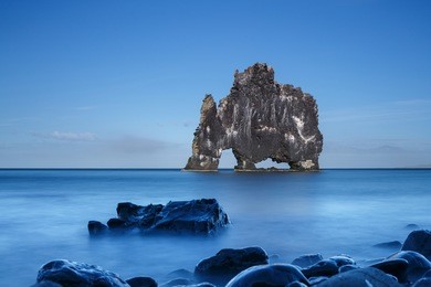 hvitserkur, giant rock with the shape of a dinosaur at hunafjoraur, taken at the blue hour with a long exposure time