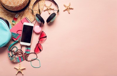  top view of essential modern young lady or girl on vacations.woman's summer holidays accessories composed on pastel color background. beach fashion , summer concept. trendy colors.