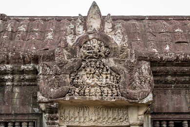 the hidden wall, terrace of the leper king, carvings of nagas and deities of the underworld, angkor wat, siem reap. cambodia