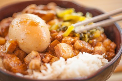 braised pork and egg on rice. soy-stewed pork rice. taiwanese cuisine 