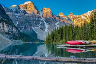 sunrise at moraine lake near canoe docks in banff national park (canada, june) 