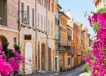 old town street of aix en provence at summer day, france
