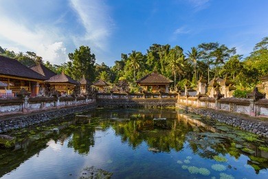 tirta empul temple in bali island indonesia - travel and architecture background