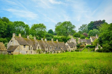 arlington row, bibury, village and civil parish in gloucestershire, england. it is on both banks of the river coln which rises in the same district, named cotswold, and which is a thames tributary.
