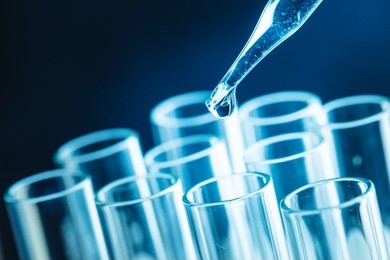 science research concept,dropping chemical liquid to test tube,