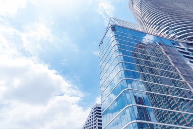 abstract texture of blue glass modern building skyscrapers. business background.