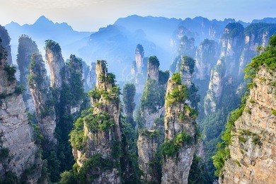 landscape of zhangjiajie. taken from old house field. located in wulingyuan scenic and historic interest area which was designated a unesco world heritage site as well as aaaaa scenic area in china.
