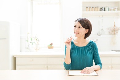 attractive asian woman in the kitchen