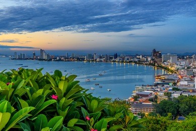 the building and skyscrapers in twilight time in pattaya,thailand. pattaya city is famous about sea sport and night life entertainment.