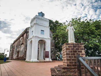 st. paul's church with a statue of st. francis xavier in malacca, malaysia