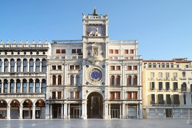astronomical clock tower with zodiac signs on piazza san marco in venice, italy