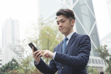 business man use mobile phone