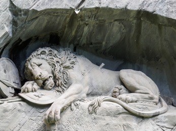 lewendenkmal, the lion monument landmark in lucerne, switzerland. it was carved on the cliff to honor the swiss guards of louis xvi of france.