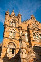 chhatrapati shivaji or victoria terminus train station in mumbai, india.