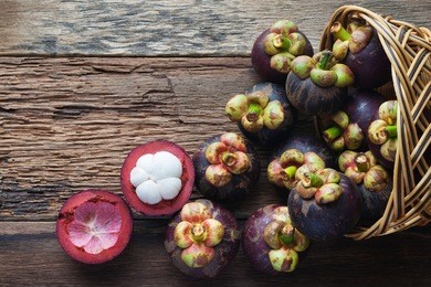 mangosteen fruit on wood table with top view