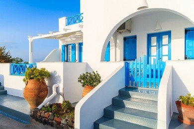 white architecture of greek style apartments in imerovigli village on santorini island, cyclades, greece