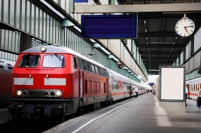 train in the station with clock