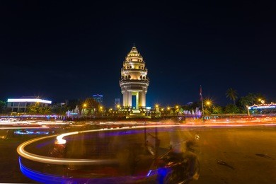 traffic rush around the independence monument,phnom penh, cambodia capital city. blurred motion archived with long exposure.