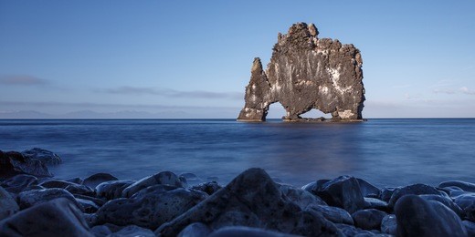 hvitserkur, giant rock with the shape of a dinosaur at hunafjoraur, taken at the blue hour with a long exposure time

