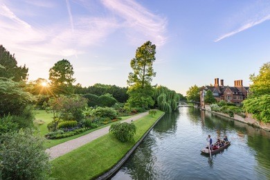 cam river at sunset in cambridge, england
