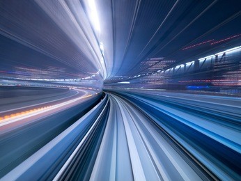 motion blur of train moving inside tunnel in tokyo, japan