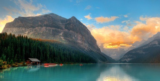 banff national park lake louise sunrise panorama with mountains and forest in canada.