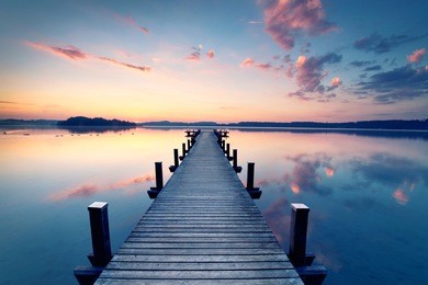 long pier leading out onto the lake, sunrise on lake, long way out                                
