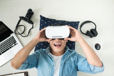 top view of man wearing virtual reality goggles