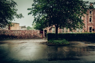 rain on a street in bristol, england
