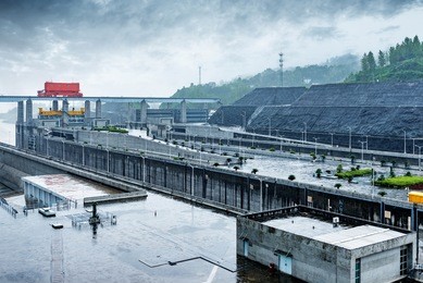 china yangtze river three gorges dam in the rain.