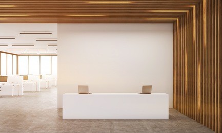 reception room interior. computers on desks. wooden wall and ceiling. concrete floor. 3d rendering. toned image. mock up