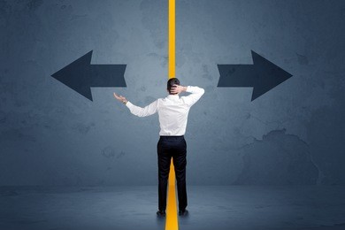business person choosing between two options separated by a yellow border arrow concept