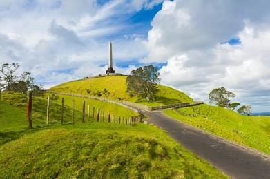 obelisk on the summit of the one tree hill reminds of signing the treaty of waitangi, the treaty of the maori people with the british empire. auckland, new zealand
