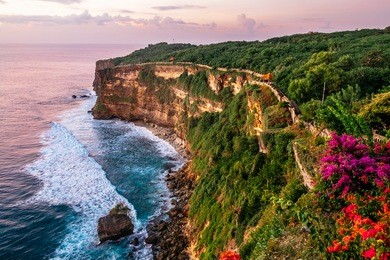 scenic landscape of fantastic sunset at uluwatu bali. travel bali, indonesia. sunset tranquility in bali. sunset at uluwatu cliff, indonesia landmark. explore fantastic sunset in bali, travel concept 