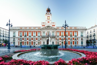 the old post office at puerta del sol, km 0, madrid, spain