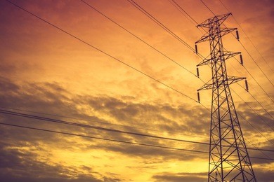 high voltage post.high-voltage tower sky background.vintage color