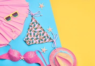 fashion summer clothes, accessories set. beach outfit. trendy swimsuit bikini, stylish woman sunglasses. creative art. tropical pink pastel color. flat lay concept