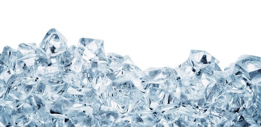 chunks of ice rolled in heap isolated on white background