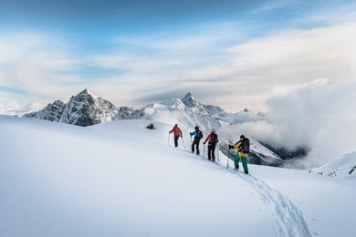 skitouring in canadian rockies with mountain views in winter