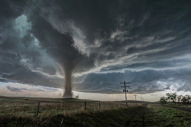 closer than weâ??ve ever been to a tornado before, we witnessed this unbelievable tornado form in a field right next to our car whilst storm chasing in colorado, usa.