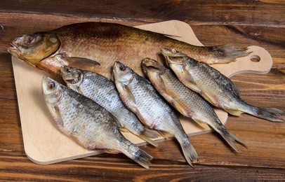 dried fish on a wooden table