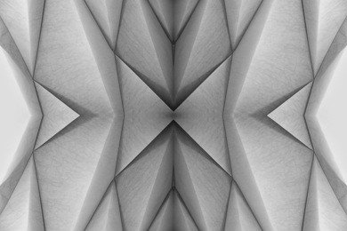 paper architecture. model / miniature / maquette for project of contemporary building. abstract polyhedron / polygonal structure of wall, ceiling or roof. abstract geometric pattern with soft lighting