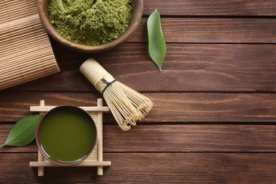 fresh matcha tea on wooden background
