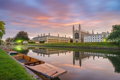 clare & king's college with beautiful sky at sunrise and fog on cam river in cambridge, uk