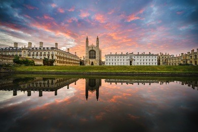 king's college with beautiful dramatic sky at sunrise in cambridge, uk